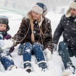 family in snow