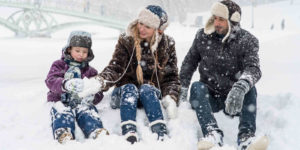 family in snow