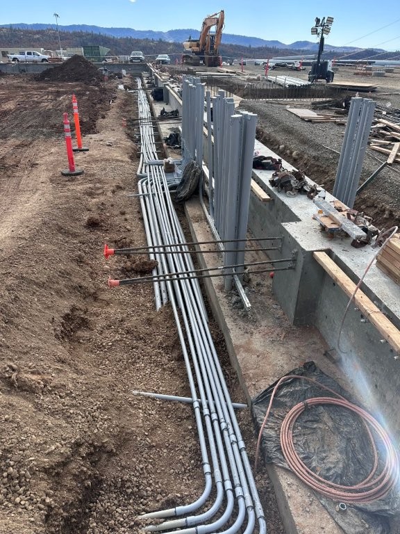 Electrical conduit installed in a utility trench