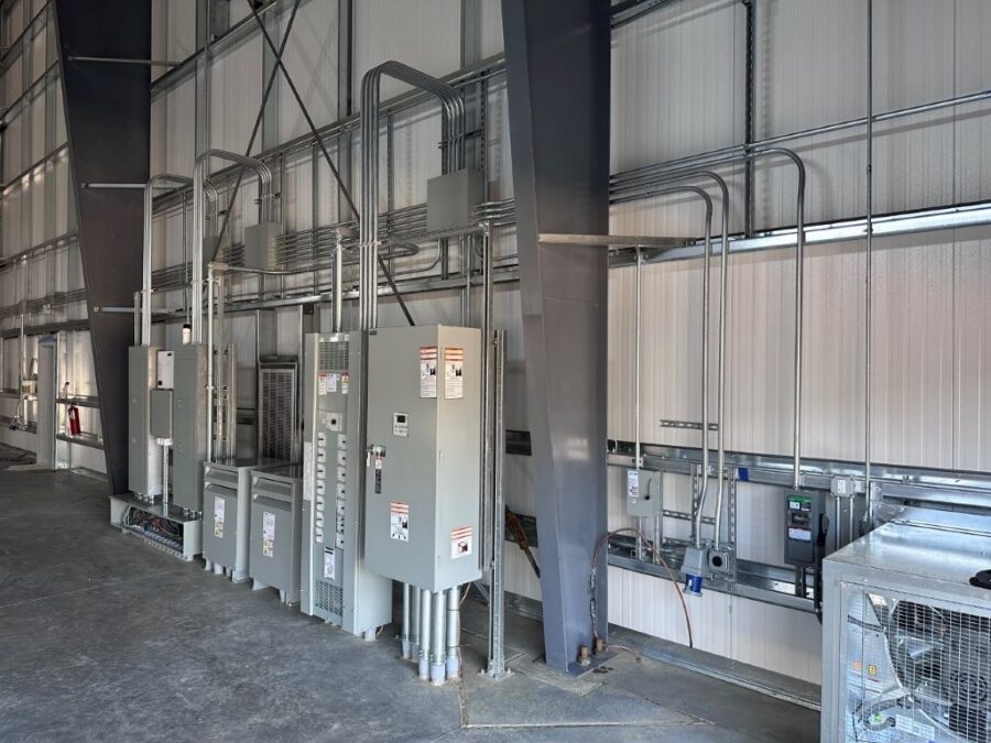 Angled view of electrical panels inside warehouse